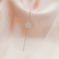 Silver S-shaped long earrings with pavé-set star charms on soft pink satin background - Star Style (DZ-700)
