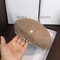 Woolen camel beret hat with pearl trim and golden M letter buckle for women - Mocha