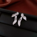 Close-up of silver abstract flower earrings with brushed metal texture on a black display - Silver Needle-Silver-Brushed Silver Petal(36#)