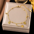 Elegant gold heart charm anklet with small beads and lobster clasp on beige display box - JLB5012 Heart Tassel