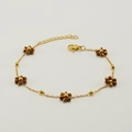 Gold chain bracelet with brown crystal flower charms and adjustable lobster clasp closure - Bracelet / Bronze