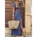 Boho blauwe maxi-jurk met bloemenprint, V-hals en split voor een zomerse look - S / Blauw