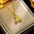 Gold teddy bear necklace with crystal clover stone pendant for a cute luxury look - Gold