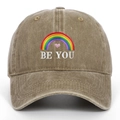 Close-up of rainbow and Be You embroidery on vintage washed cotton baseball cap - One Size / Khaki