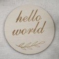 Round wooden baby milestone card featuring engraved hello world text on burlap background - Hello World (Hello world) / Single Piece