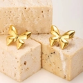 Eleganti orecchini a fiocco dorati su cubi di pietra beige con finitura in metallo lucido - Farfalla Oro Perla