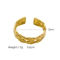 Macro shot of gold woven texture ring with dimensions 2cm inner diameter and 0.6cm width - Gold-Twist