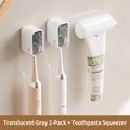 Wall-mounted toothbrush holder set with 2 smoky grey covers and automatic toothpaste dispenser - Gray*2 + Squeezer