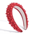 Padded wide headband in vibrant red featuring dense faux pearl embellishments - Red