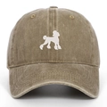 Close-up of white poodle embroidery on vintage washed cotton baseball cap texture - Khaki