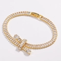 Macro detail of gold tennis bracelet featuring step-cut white cubic zirconia crystals - Gold White Zirconia