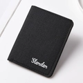 Slim black canvas folding wallet for men featuring the Slardar white script logo - Black