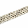 Vue détaillée de perles d'agate géode de 5x8mm en forme d'abaque avec texture naturelle - 5x8mm (39 pièces) / Blanc Naturel
