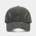 Detail of distressed ripped cotton baseball cap in charcoal gray with vintage finish - Gray