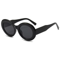 Retro oval frame sunglasses in black with dark lenses shown from a 45-degree angle - Black Frame Black Grey Lens