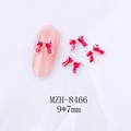 Détail de bijoux d'ongles en émail rouge 9x7mm avec des bordures en alliage doré - Nœud Bordure Argentée Rouge (8466)