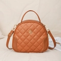 Brown quilted PU leather round crossbody bag with golden clover metal hardware and top handle - Brown