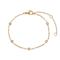 Bracciale in acciaio inossidabile dorato con cinque pietre di zirconia bianca tonde - Bracciale / Oro
