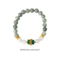 Detailed shot of aventurine jade beaded bracelet with golden filigree and red zircon - Aventurine Jade Style (WB335)