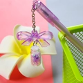 Cute purple neutral pen with a glitter bottle and purple bow pendant accessory - Butterfly Drift Bottle - Purple