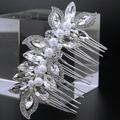 Detailed view of silver hair comb with marquise rhinestones and white pearls on crystals - Style 81257
