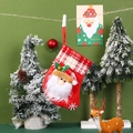 E3-1 Calcetín pequeño con campana Papá Noel