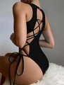 Detail view of black one-piece swimsuit with intricate lace-up back and side cut-outs - Black