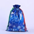 Blue Christmas gift bag with white snowflakes and red-green drawstring closure - 49*69 Moon Blue