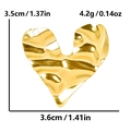Macro view of gold heart pendant with irregular water ripples and size measurements - Gold