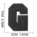 Macro shot of 7cm black chenille letter G patch with dimensions and texture details - Letter G / Black