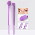 Detail of two purple eyeshadow brushes with fluffy bristles and transparent handles - 2 Pcs Purple