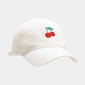 Close-up of red cherry embroidery and cotton twill texture on a beige baseball cap - M (56-58cm) / White