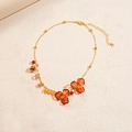 Collana retrò con fiori in acrilico ambra, catena dorata e perline sfaccettate - Collana-Fiore in Acrilico Marrone