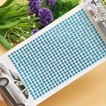 Close-up of 4mm blue acrylic rhinestone stickers for DIY car and phone decoration - 4mm / Aqua