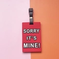 Red PVC luggage tag with 'SORRY IT'S MINE' embossed text and black adjustable strap - SORRY IT'S MINE Slogan / Red