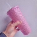 Sparkling pink rhinestone double-walled straw cup held in hand for size display - 601-700ml / Pink