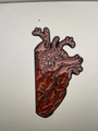 Cartoon anatomical heart enamel pin in red and brown colors with black outline design - Red Brown Anatomical Heart