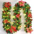 2.7m Christmas garland with red poinsettias, ornaments and warm LED lights for decor - Premium Pre-lit Style / Red