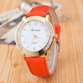 Women's quartz watch with bright orange leather strap and gold rhinestone case - Orange