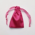 Pink satin drawstring pouch with ribbon closure for cosmetics and small gift storage - Rose Red