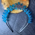 Detail of bohemian sky blue crystal crown featuring moon pendants and silver wire wrap - Sea Blue + Silver Moon