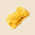 Close-up of yellow corduroy baby headband with large bow on beige background - 18.5*8.5cm / Gold Yellow