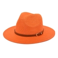 Detail of orange straw panama hat featuring a brown leather band and gold metal buckle - Orange