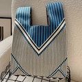 Knitted tote bag with blue, beige, and black geometric vertical stripes and V-patterns - Vertical V-shaped Blue