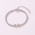 Sparkling silver-tone tennis bracelet featuring a cubic zirconia bow heart centerpiece design. - Heart to Heart Style (Clear Rhinestone) / White Gold