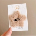 Cute beige plush star hair clip with soft faux fur texture on a black metal base - Plush Star Hair Clip / Khaki