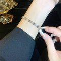 Tennis bracelet in gold plating with sparkling cubic zirconia and adjustable slide closure - Gold Purple Zirconia Bracelet (A2116)