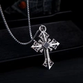 Macro shot of silver cross necklace with a square black gemstone in a vintage hip hop style - Silver Black Gem Cross (XL0321)