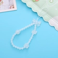 Detailed view of white beaded phone strap featuring clear bows and flower accents - K1681 Mermaid Beaded Phone Chain (White)