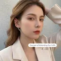 Elegant gold multi-layer ear clip set with star and teardrop charms for non-pierced ears - EH0898 Ear Clips Pair